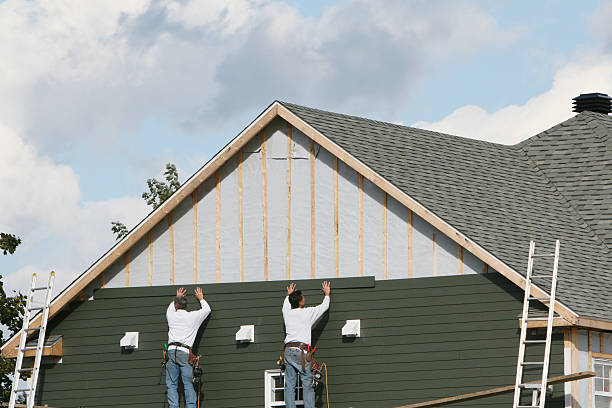 Professional Siding technician working in New Park, PA